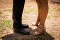 Latin couple standing in front of each other. Close up of lower limbs. Royalty Free Stock Photo