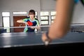 close up of female athlete preparing to serve against opponent Royalty Free Stock Photo