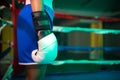 Close-up of female boxers hand in glove
