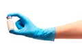 Close up of female doctor's hand in blue sterilized surgical glove holding glass ampoule with white powdered drug Royalty Free Stock Photo