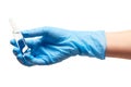 Close up of female doctor's hand in blue sterilized surgical glove holding transparent white glass ampoule with a drug Royalty Free Stock Photo