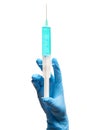 Close up of female doctor's hand in blue sterilized surgical glove with plastic medical syringe filled with blue drug