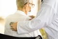 Close up of a female doctor`s hand using stethoscope listening to heartbeat and breath of senior patient,physician checking heart Royalty Free Stock Photo