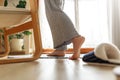 Close up of female feet getting out of bed in the morning. Wake up woman - image woman legs in bedroom walking to