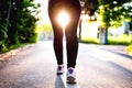 Close-up of female feet, legs and shoes while running