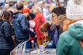 Close up of female food stall vendor at Frome Sunday Market, Somerset, UK