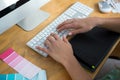 Close-up of female graphic designer working at desk Royalty Free Stock Photo