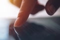 Close up of female finger pushing digital tablet touch screen Royalty Free Stock Photo