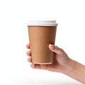 Close up female hand holding a Coffee paper cup isolated on white background. Blank cup mockup Royalty Free Stock Photo