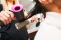 Close up of female hand holding hairdryer Royalty Free Stock Photo