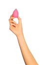 Female hand holding pink make up sponge