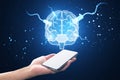 Close up of female hand holding smartphone with glowing connected brain hologram on blurry blue background. AI, mind and neurology Royalty Free Stock Photo