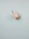 Female hand holding tweezers Royalty Free Stock Photo