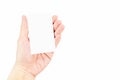 Close up Female hand holding white blank business card isolated Royalty Free Stock Photo