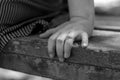 Close-up of a female hand on a park bench Royalty Free Stock Photo