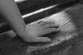 Close-up of a female hand on a park bench Royalty Free Stock Photo