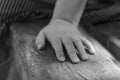 Close-up of a female hand on a park bench Royalty Free Stock Photo