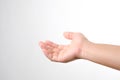 Close up of female hand reaching out and ready to help or receive. Hand open gesture isolated on white background Royalty Free Stock Photo