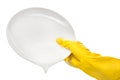 Close up of female hand in yellow protective rubber glove holding clean white plate in foam Royalty Free Stock Photo
