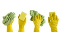 Close up of female hand in yellow protective rubber glove holding green cleaning sponge against and cloth to wipe. Royalty Free Stock Photo