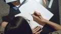 Close up of female hands of an artist or Illustrator drawing pencil sketches on paper Royalty Free Stock Photo