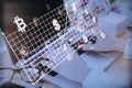 Close up of female hands at desk using laptop with abstract glowing money mesh on blurry background. Cryptocurrency and online