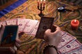 Close up female hands holding tarot cards. Fortuneteller. Witchcraft. Royalty Free Stock Photo