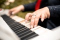 Close-up female hands playing the piano Royalty Free Stock Photo