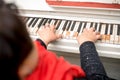 Close-up female hands playing the piano Royalty Free Stock Photo