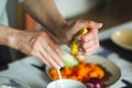 Close-up of female hands while preparing healthy food Royalty Free Stock Photo
