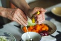 Close-up of female hands while preparing healthy food Royalty Free Stock Photo