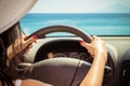 Close up of female hands on steering wheel