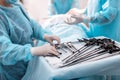 Nurse standing near table with laparoscopic instruments Royalty Free Stock Photo