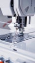 Close up female hands stitch white fabric on modern sewing machine Royalty Free Stock Photo