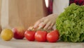 Close up female hands takes purchases refresh nutriment products in bags from grocery ecological supermarket. Unknown