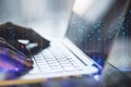 Close up of female hands using laptop keyboard with abstract polygonal lines on blurry background. Big data, index, technology,