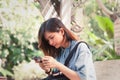 Close-up of female hands using modern smart phone while working,Young woman using a touchscreen smartphone Royalty Free Stock Photo