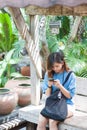 Close-up of female hands using modern smart phone while working,Young woman using a touchscreen smartphone Royalty Free Stock Photo