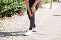 Jogger Having Pain In Her Knee