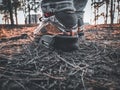 Close up of female legs in fashionable sneakers. Feet on the background of nature Royalty Free Stock Photo