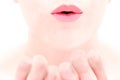 Close up of female lips blowing a kiss Royalty Free Stock Photo