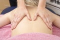 Close Up of female masseuse with client