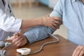 Close up of female nurse measure blood pressure with monitor Royalty Free Stock Photo