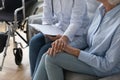 Close up of female nurse support sick senior elderly patient Royalty Free Stock Photo