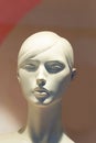 Close-up of a female plastic mannequin head with a pretty face Royalty Free Stock Photo