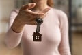 Close up of female renter show keys to new home Royalty Free Stock Photo