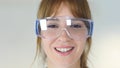 Close Up of Female Reseach Scientist, Doctor Wearing Protective Glasses Royalty Free Stock Photo