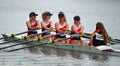 Close up of Female Scullers, Newark Coxed four on the River Ouse at St Neots. Royalty Free Stock Photo