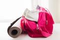 Close up of female sports stuff in bag Royalty Free Stock Photo