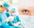 Close-up of a female surgeon with his team Royalty Free Stock Photo